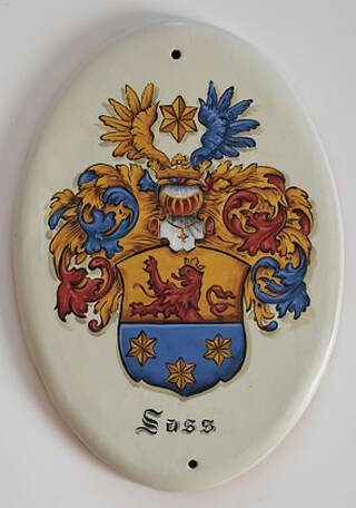 Family crest painting on hand crafted ceramic tiles
