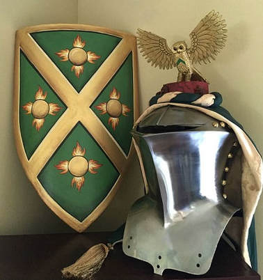 Wooden knight shield with helmet and crest