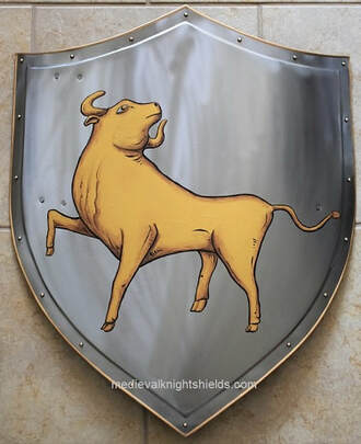 Custom metal knight shield  24 x 32 inch bull painted w. gold leaf 