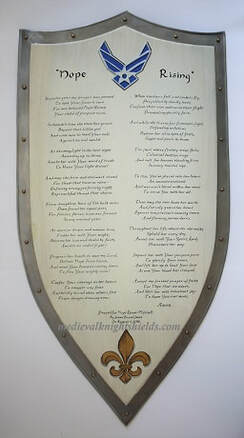 Metal knight shield with poem, airforce logo and fleur de lis